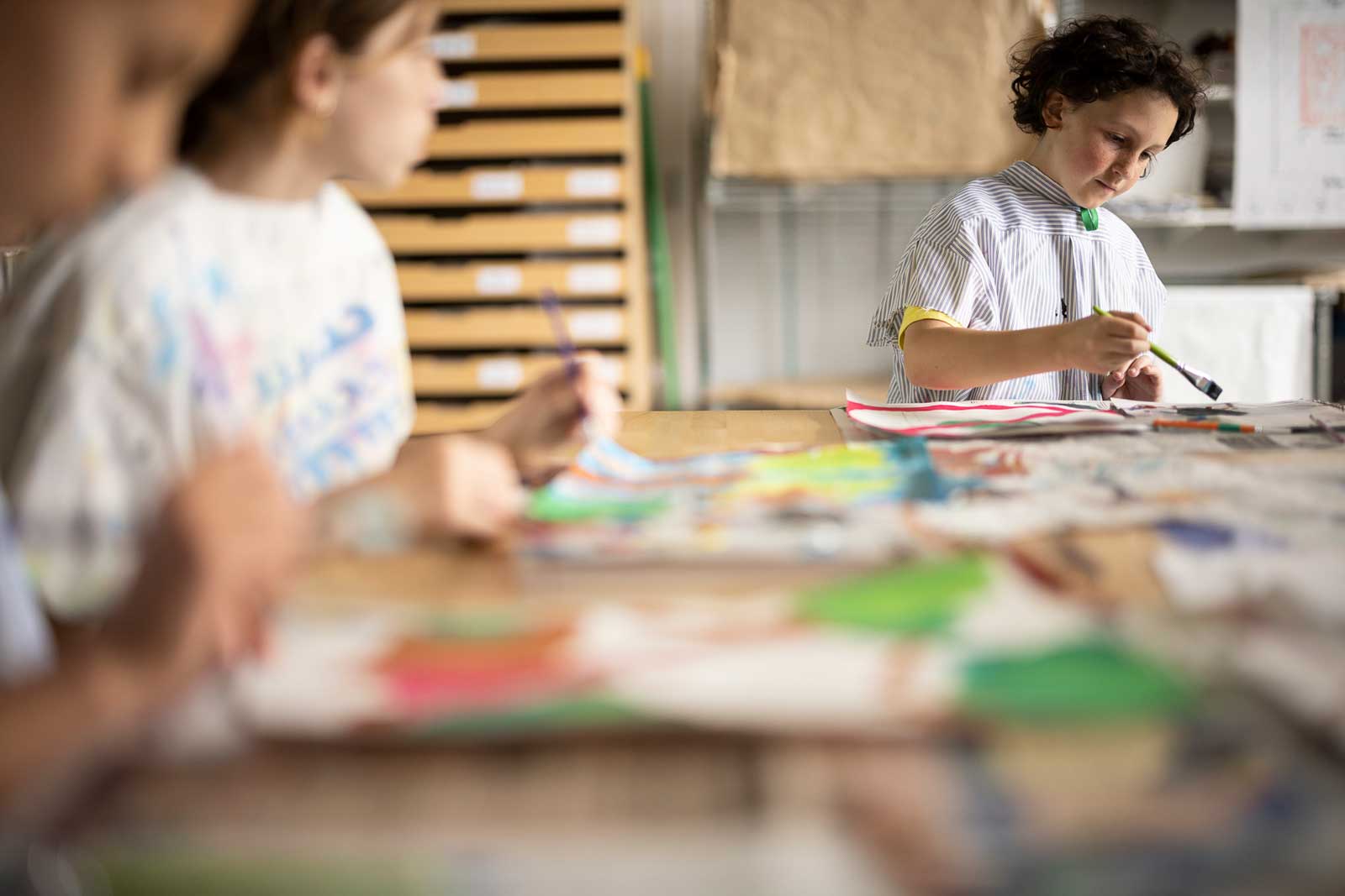 Two students paint in the Coolidge Art Studio