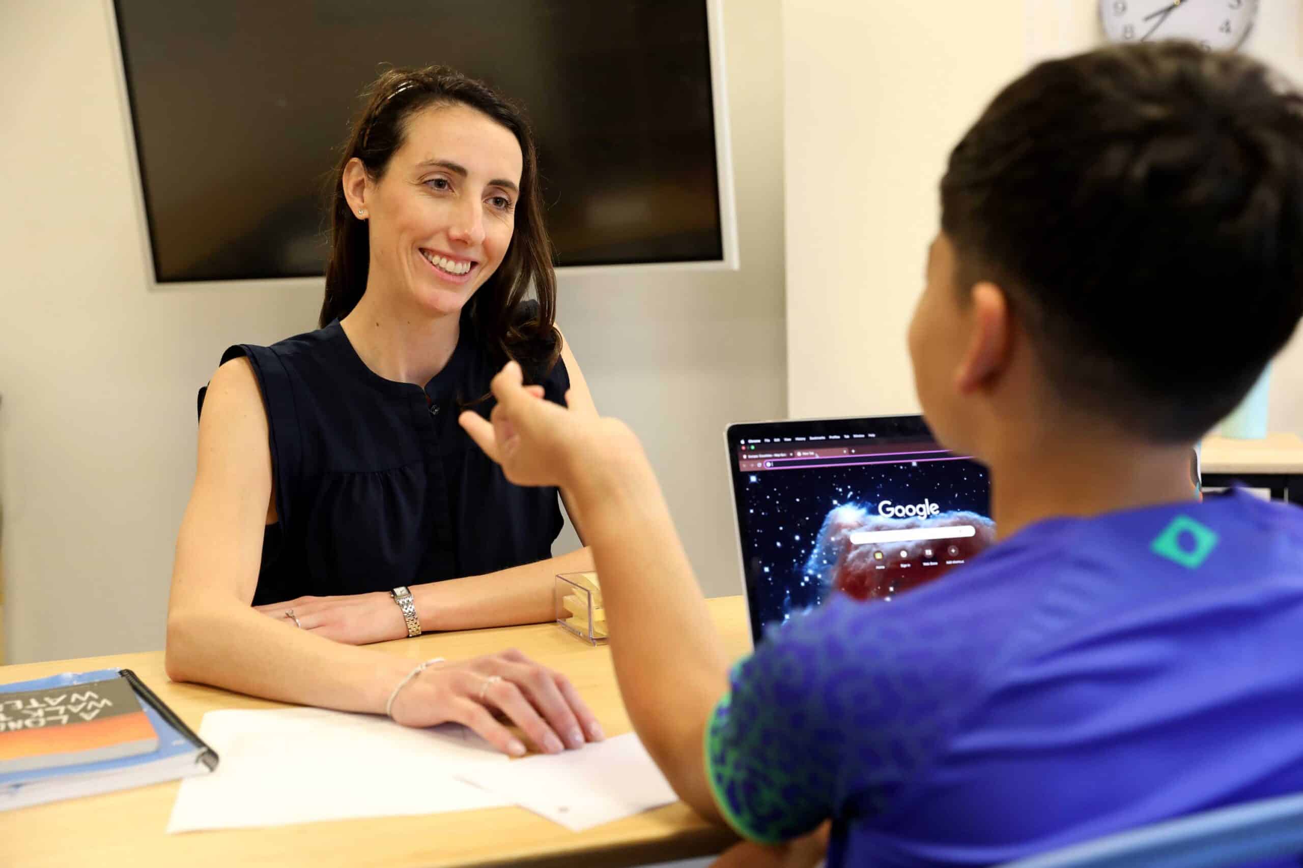 A student and teacher in skills and strategies class